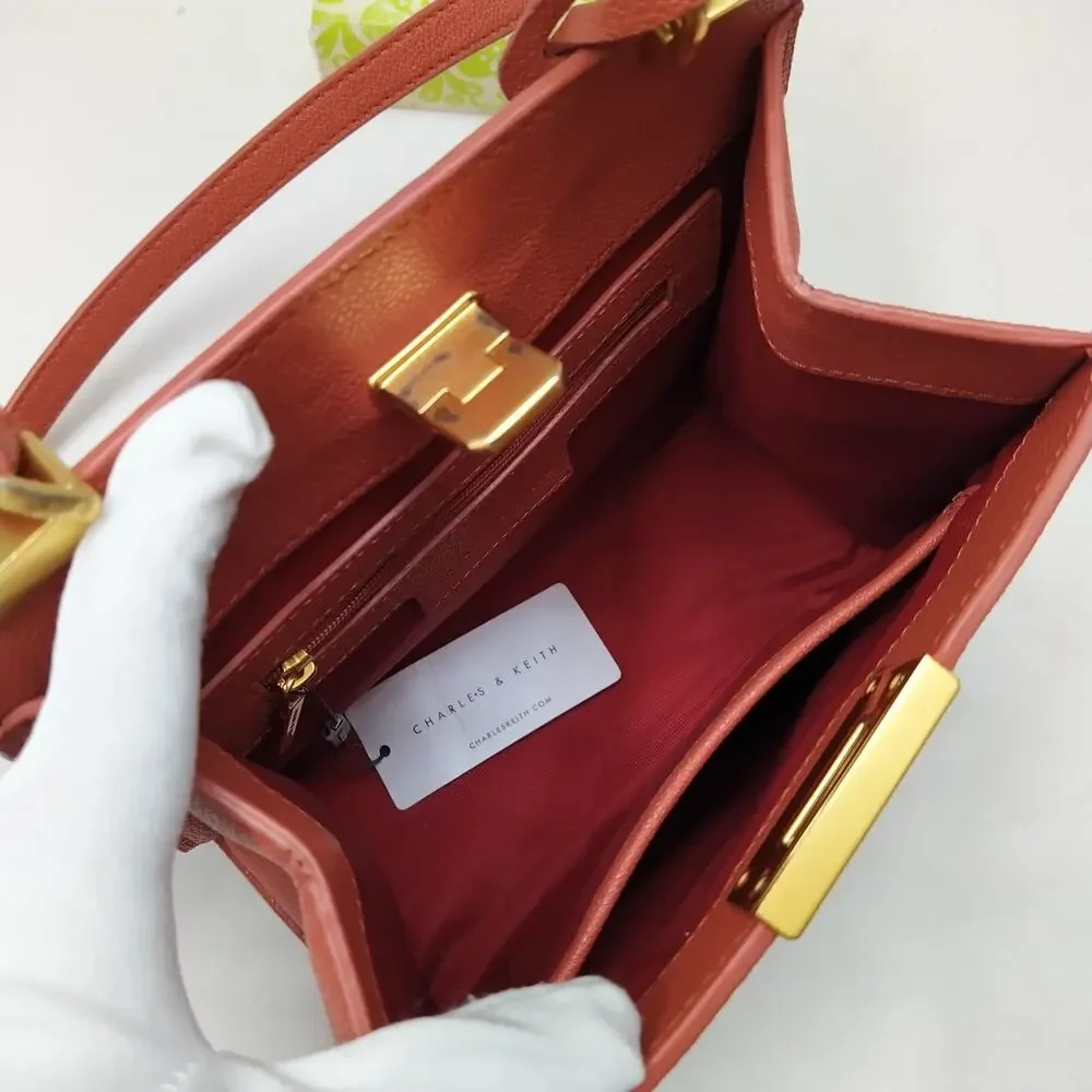 CHARLES & KEITH Orange Leather Pushlock Top Handle Satchel Crossbody Bag